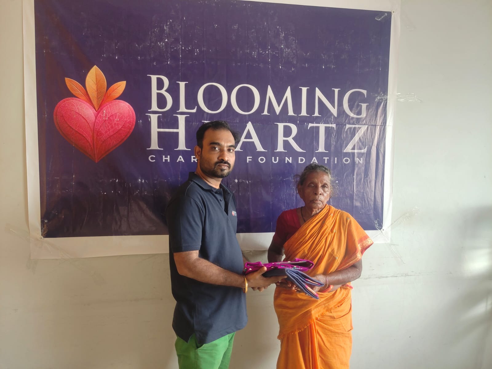 Pattu paati receiving new clothes sponsored by Blooming Heartz